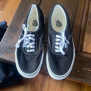 Men’s black and white Vans